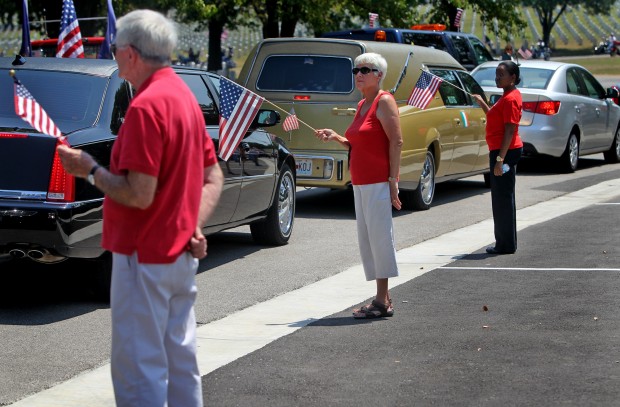 Hearse carrying Chief Petty Officer Sean Patrick Sullivan enters Jefferson Barracks